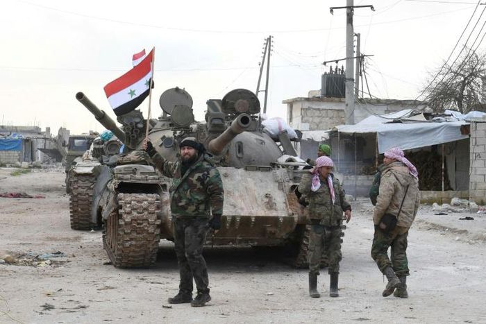 Syrian government forces deploy near the main Damascus-Aleppo highway as they establish full control of the strategic route for the first time since 2012