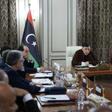 Libya's UN-recognised Prime Minister Fayez al-Sarraj (C) presided over a cabinet meeting where the implementation of a military deal with Turkey was 'unanimously approved'