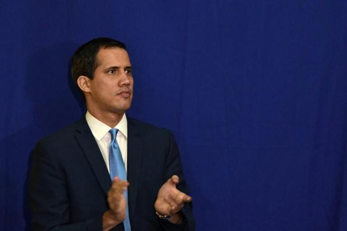 Juan Guaido, pictured on January 5, was re-elected speaker of the National Assembly while rival lawmaker Luis Parra also claimed the title after a separate vote