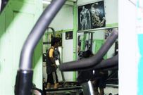 <strong>On a typical evening, gymgoers flex in front of mirrors, watching their shoulders broaden to a backdrop of vinyl blowups, local pop tunes flowing into the street.</strong>