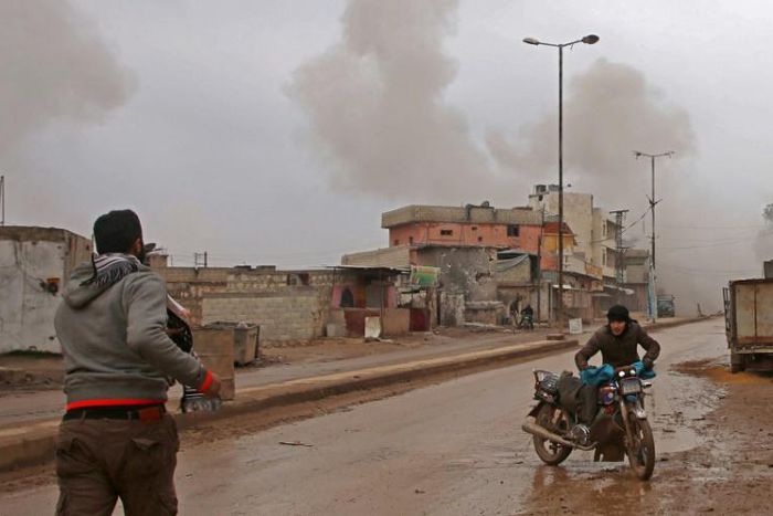 Some of the last remaining residents of the rebel-held town of Atareb flee as Syrian government forces draw ever closer in their offensive against the last major rebel pocket of Idlib