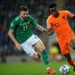 Netherlands winger Quincy Promes vies with Northern Ireland's Stuart Dallas during their goalless draw