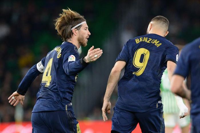 Sergio Ramos (left) took to a treadmill while it was the garden with his dog for his Real Madrid teammate Benzema