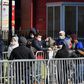New Yorkers queue outside Elmhurst Hospital Center in Queens to get tested for the coronavirus