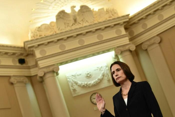 Fiona Hill, the former top Russia expert on the National Security Council, takes the oath before testifying during the House Intelligence Committee impeachment hearing against President Donald Trump