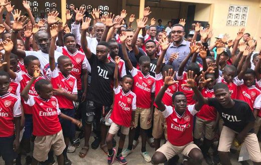 Arsenal’s Mesut Ozil reacts after discovering Ghanaian club is named after him