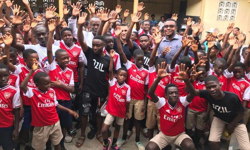 Arsenal’s Mesut Ozil reacts after discovering Ghanaian club is named after him