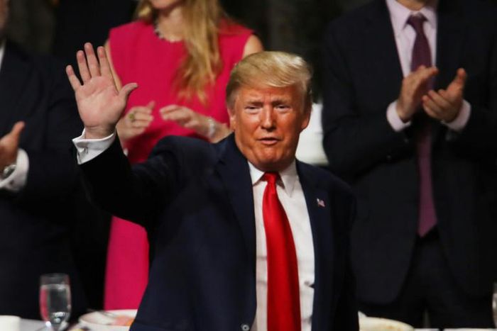 President Donald Trump says the impeachment investigation that threatens him is a "delusional witch hunt'