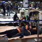 Travellers wait for flights to get back home at Moscow's Vnukovo airport