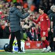 'Outstanding': Liverpool manager Jurgen Klopp  shakes hands with Takumi Minamino