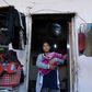 New mum Mirela, 18, is one of hundreds of thousands of Roma living in slums across the Western Balkans for whom the first symptom of the coronavirus pandemic has been hunger


is one of hundreds of thousands of Roma living in slums across the Western B...