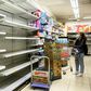Photos of empty supermarket shelves prompted the government to condemn those spreading rumours that the city was running out of toilet paper