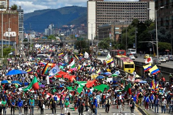 Indigenous people and students take part in a protest in Bogota against the government of Colombian President Ivan Duque