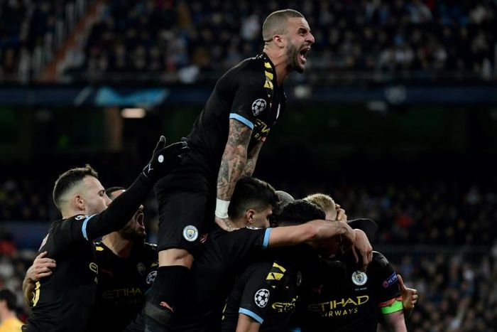 Manchester City's players celebrate their second goal against Real Madrid