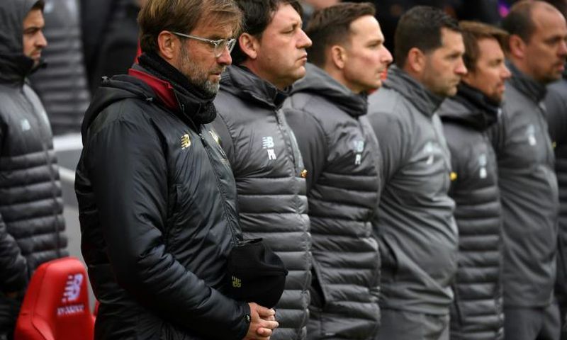 Liverpool manager Jurgen Klopp and his staff observe a minute's silence to mark 30 years since the Hillsborough disaster, in April 2019