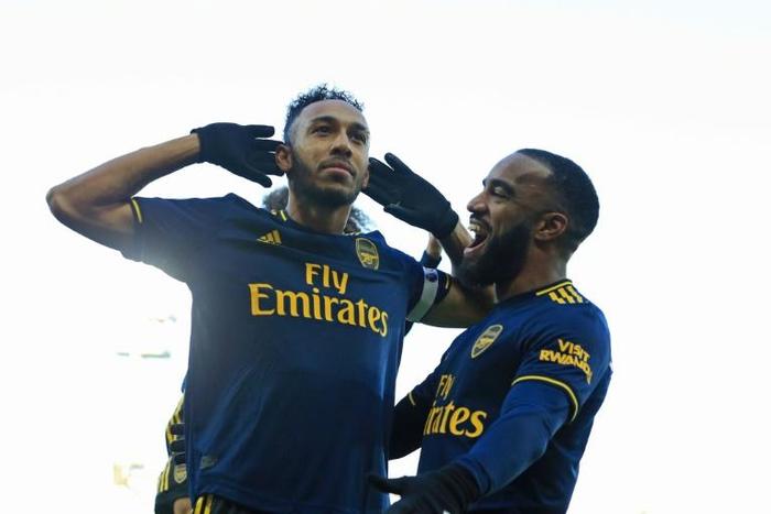 Pierre-Emerick Aubameyang scored twice to salvage a 2-2 draw for Arsenal at Norwich