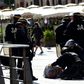 Police attend to injured England fan Andrew Bache following clashes with Russian fans in Marseille ahead of the Euro 2016 football match between England and Russia