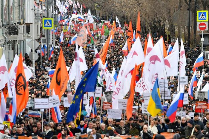 Opposition supporters march in memory of murdered Kremlin critic Boris Nemtsov in downtown Moscow on February 29, 2020