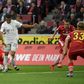 Serge Gnabry (C) scored two goals in Bayern Munich's 4-1 win at Cologne which left the defending champions a point clear at the top of the Bundesliga on Sunday.