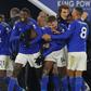 Super sub: Kelechi Iheanacho (centre) is mobbed by his teammates after a late winner against Everton