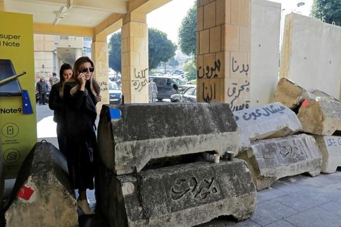 Barricades were erected in Beirut to control access to protest sites in Lebanon's capital where counterdemonstrators have attacked protesters