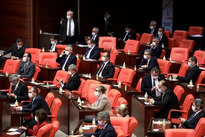 Parliament passed the law to release tens of thousands of prisoners after several days of debate