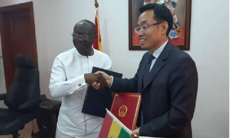 Ken Ofori-Atta and Chinese Ambassador Shi Ting Wang
