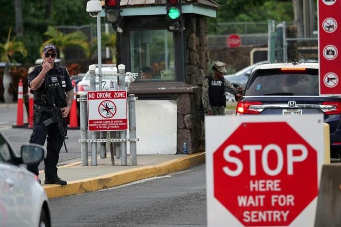 Officials said the Navy was leading the investigation into the shooting to determine what prompted it
