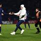 Fan club: A supporter runs towards Paris Saint-Germain's Edinson Cavani during the game at Bondoufle, south of Paris, on Sunday