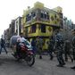 Indian police patrol a riot-affected area in New Delhi