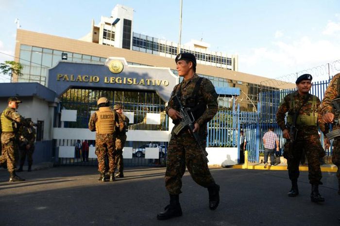 Soldiers guard the El Salvador Legislative Assembly after troops entered and stood guard inside parliament for the first time since the early 1990s during the country's civil war