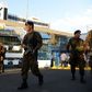 Soldiers guard the El Salvador Legislative Assembly after troops entered and stood guard inside parliament for the first time since the early 1990s during the country's civil war