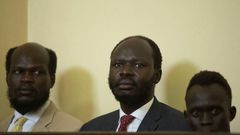 Peter Biar Ajaj (C) was convicted for  espionage, but has now won a pardon