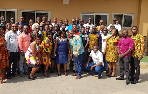 Opportunity International holds management performance review workshop
