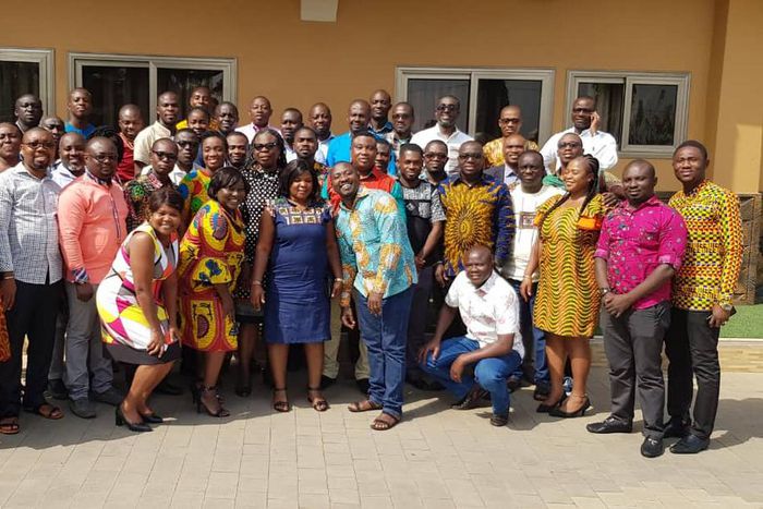 Opportunity International holds management performance review workshop