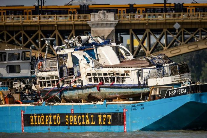 The recovered sunken Mermaid sightseeing boat as it was transported off the river Danube