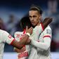 Danish forward Yussuf Poulsen (R) celebrates scoring in RB Leipzig's 3-1 home win over Augsburg on Saturday which means they will go into the Bundesliga's winter break in top spot.