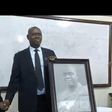 Justice Anin Yeboah receives pencil drawing from Artwork by Pimpin