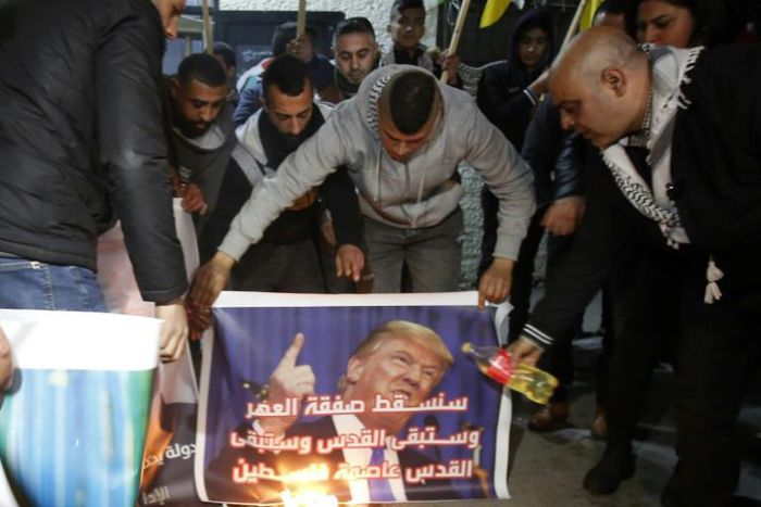 Palestinians oppose US President Donald Trump's Middle East peace plan, at a gathering in the Deheisheh refugee camp near the West Bank city of Bethlehem