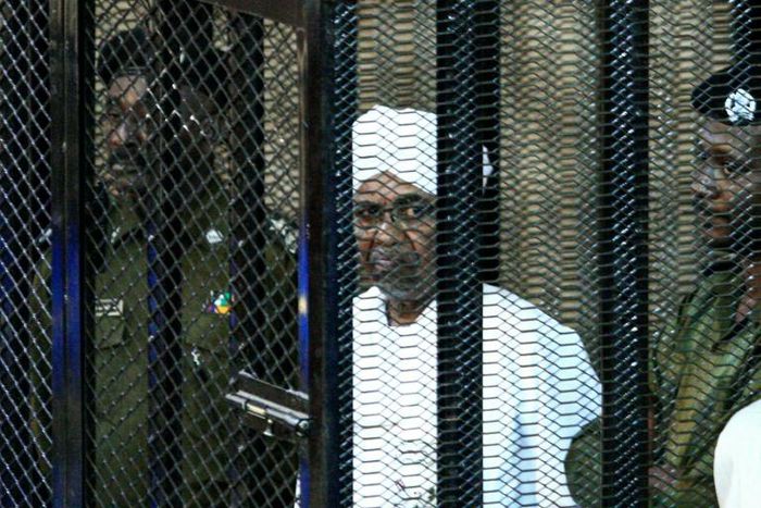 Sudan's ex-president Omar al-Bashir appears in court in Khartoum in August 2019