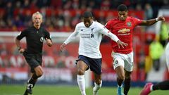Left behind: Liverpool are 27 points ahead of Manchester United