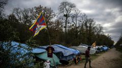 The makeshift camp set up by Tibetan asylum seekers near a  forest in Acheres, northwest of Paris.