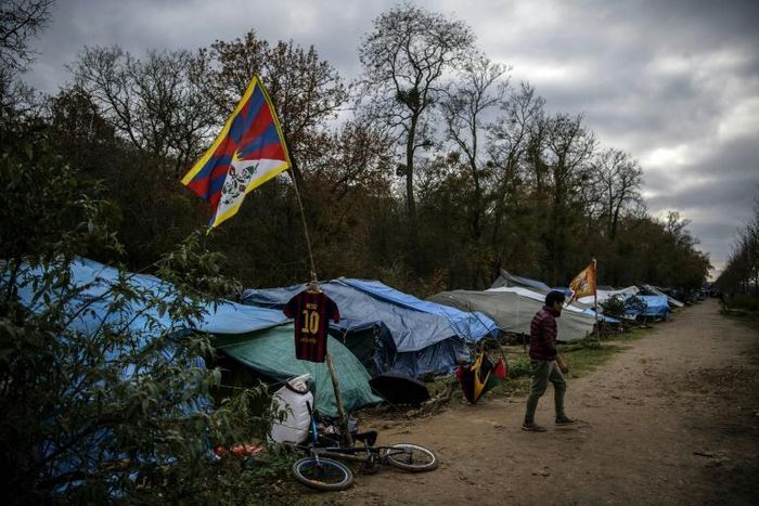 The makeshift camp set up by Tibetan asylum seekers near a  forest in Acheres, northwest of Paris.