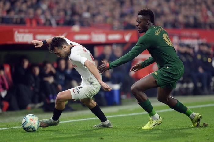 Sevilla's Spanish forward Munir El Haddadi (L) vies with Athletic Bilbao's Spanish forward Inaki Williams in this file image from January 3, 2020; La Liga and the Spanish Football Federation are yet to comment