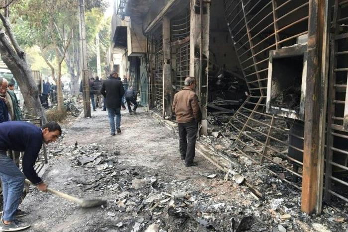 This bank was set ablaze by protesters in Iran's central city of Isfahan