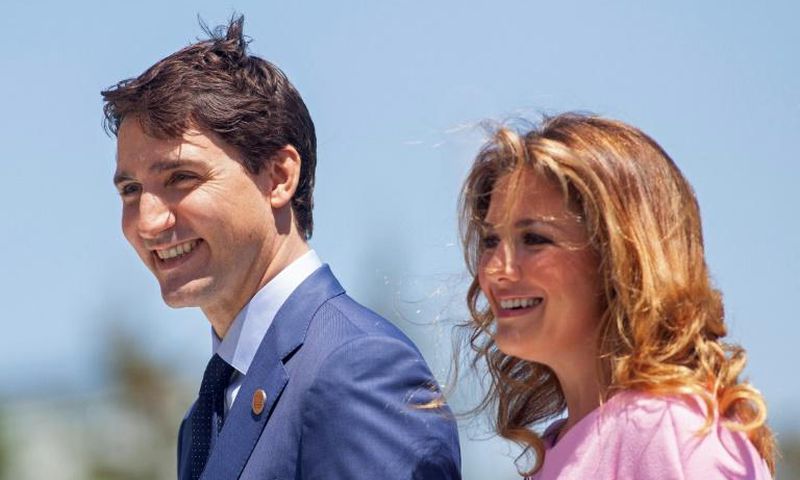 Sophie Gregoire Trudeau tested positive for the virus after returning from Britain, with her husband subsequently going into self-quarantine as a precautionary measure