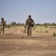 French soldiers use detectors while searching for IEDs (Improvised Explosive Devices), which kill scores each year in the jihadist-hit Sahel region