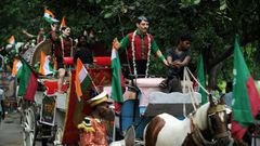 Carts with statues of former Mohun Bagan players are driven through the streets of Kolkata during celebrations marking the club's history in 2011