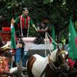 Carts with statues of former Mohun Bagan players are driven through the streets of Kolkata during celebrations marking the club's history in 2011