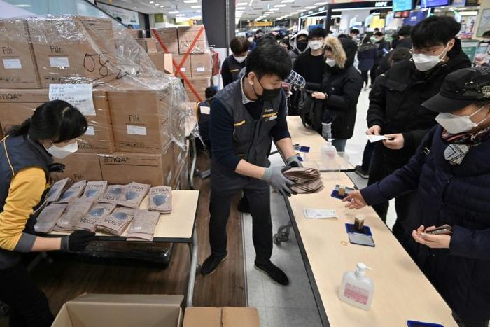 People buy face masks at a retail store in the southeastern city of Daegu, South Korea